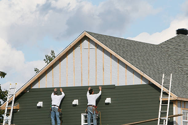 Professional Siding technician working in Lemont, PA